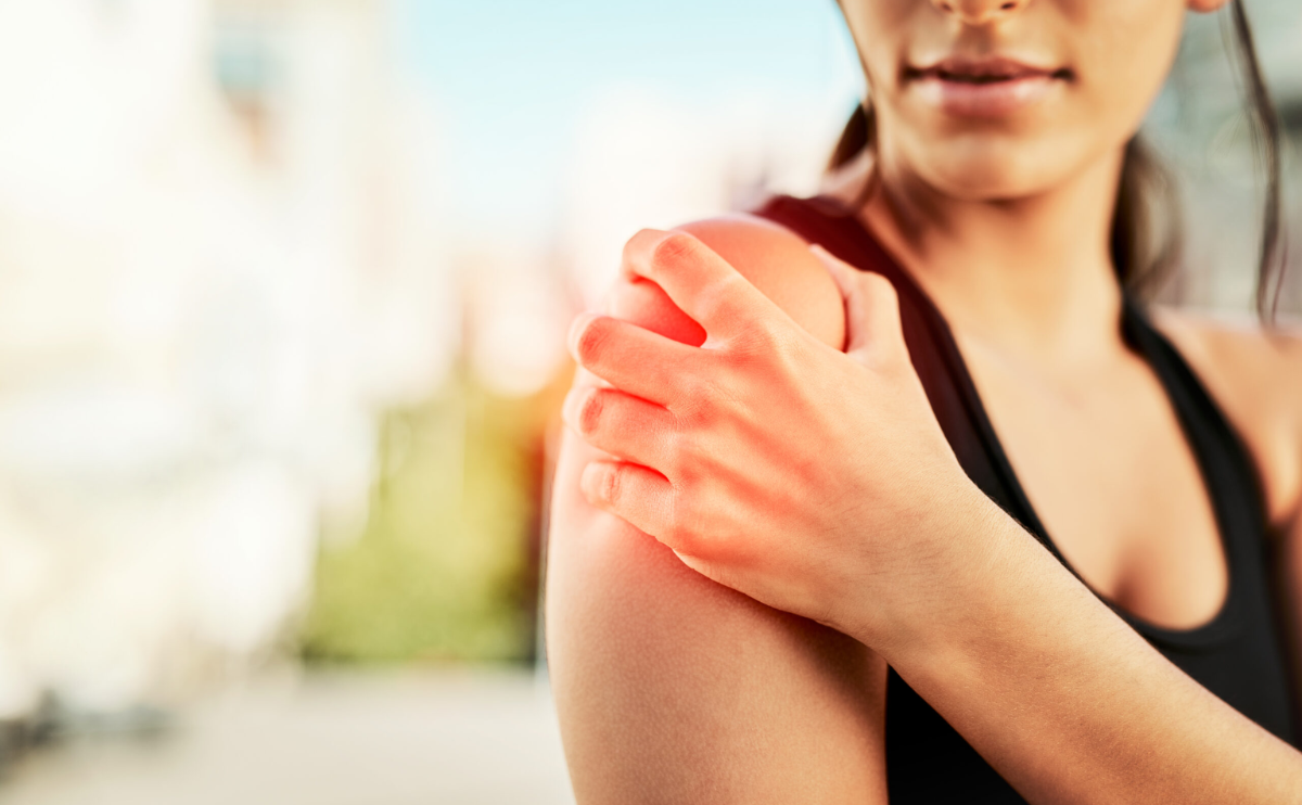 Person experiencing shoulder stiffness associated with frozen shoulder